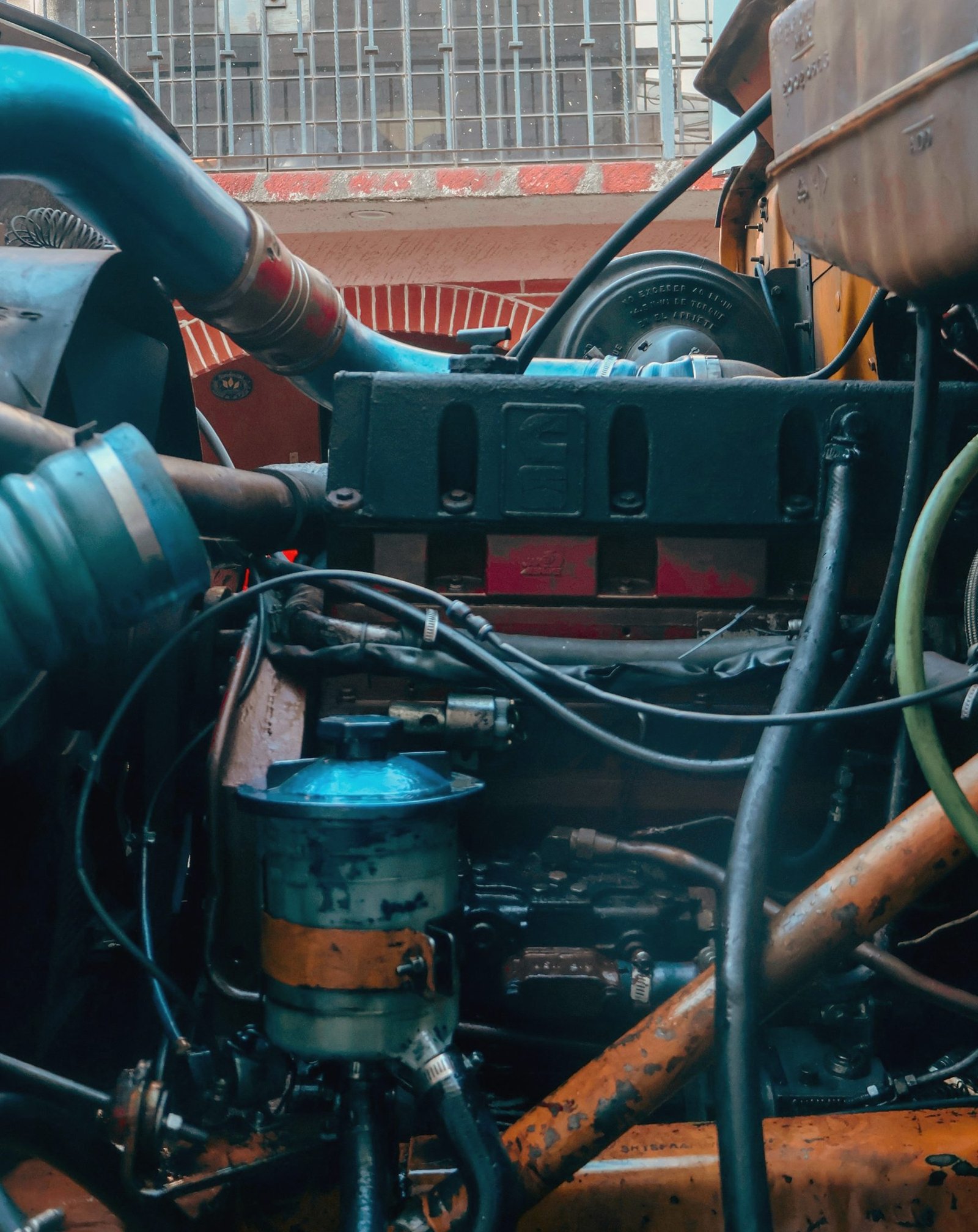 Hoses, wiring and fittings packed around a truck engine