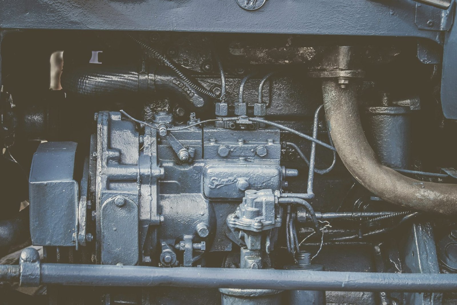 Injection pump and fuel lines on the side of a diesel engine