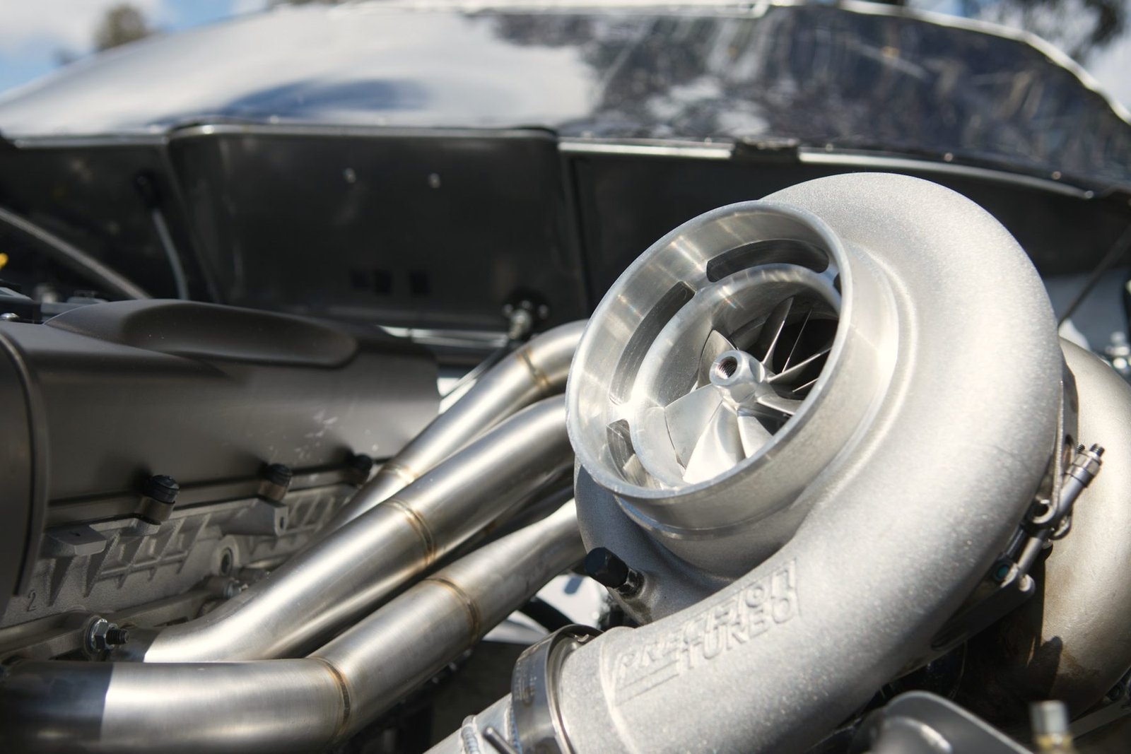 Compressor housing of a turbocharger with polished piping